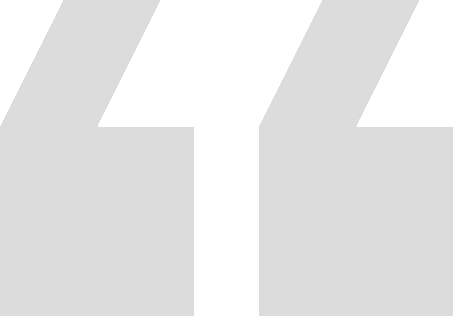 Black quotation marks on a gray background.